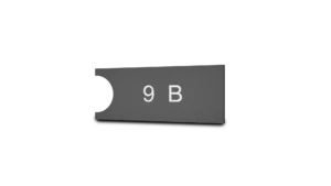 Stala-postilaatikon nimikyltin oikea puoli osoitteelle, musta valkoinen.